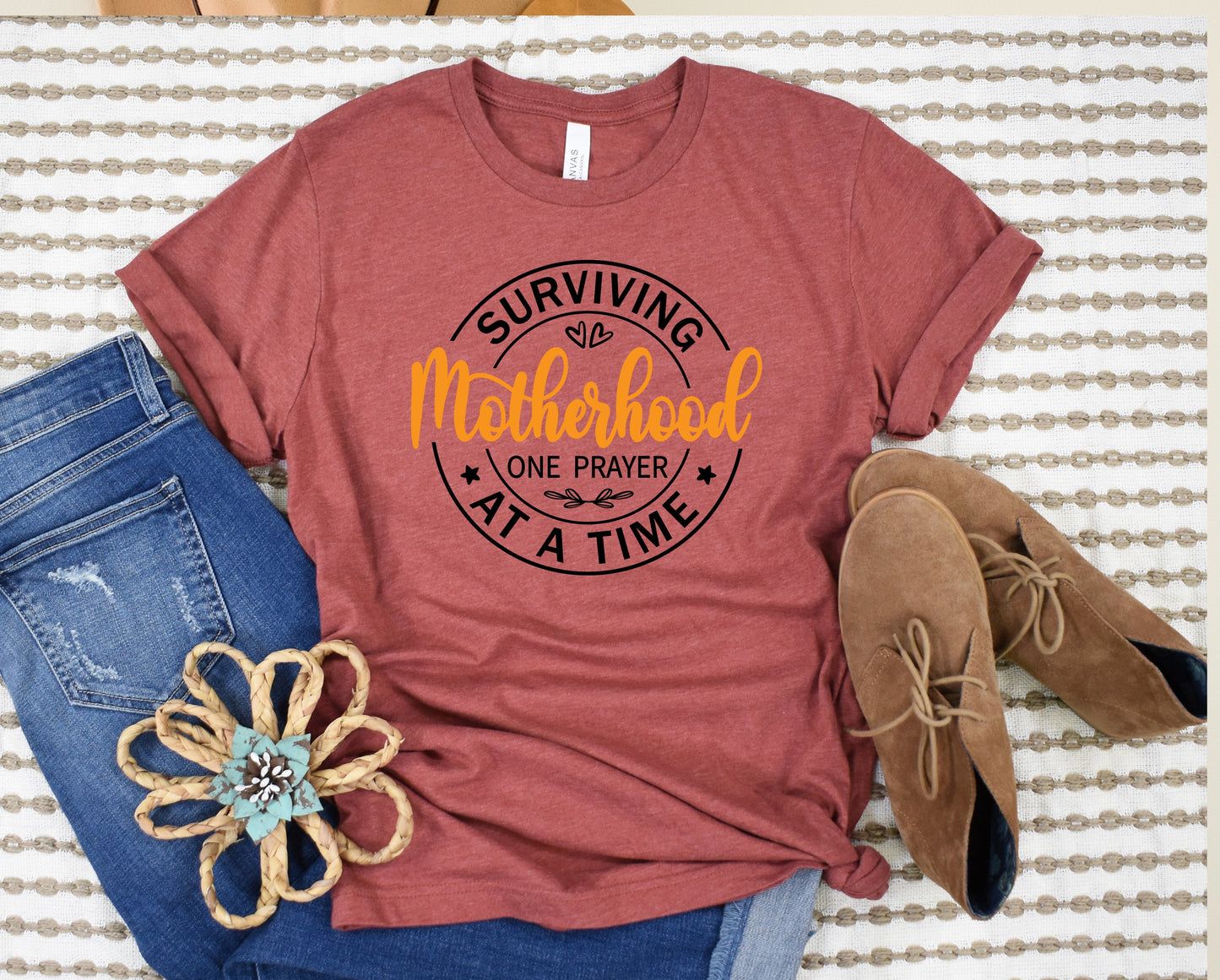 Surviving Motherhood Graphic Tee